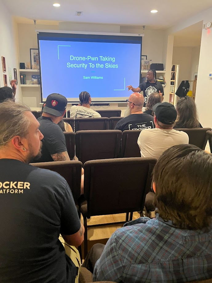 Sam Williams presenting Drone-Pwn: Taking Security to the Skies
